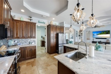 Stunning Custom Waterfront Pool Home with Nearly 2,600 Sq Ft of on Palmetto-Pine Country Club in Florida - for sale on GolfHomes.com, golf home, golf lot