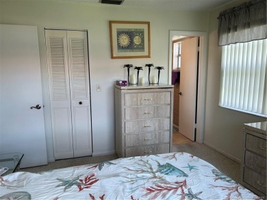 Great location of this 2 bedroom 2 bath 2nd floor corner unit on Monterey Yacht and Country Club in Florida - for sale on GolfHomes.com, golf home, golf lot