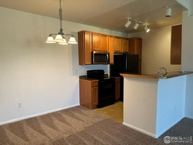 Prime Golf Course Views! Discover this stunning, move-in ready on Colorado National Golf Club in Colorado - for sale on GolfHomes.com, golf home, golf lot