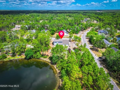 If you are looking for quiet, relaxed living in a natural on The Lakes Country Club in North Carolina - for sale on GolfHomes.com, golf home, golf lot