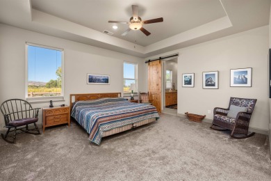 Wake up each day to sweeping, unobstructed views of the Colorado on Adobe Creek National Golf Course in Colorado - for sale on GolfHomes.com, golf home, golf lot