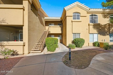 This bright second-floor condo features vaulted ceilings and an on Stonecreek Golf Club in Arizona - for sale on GolfHomes.com, golf home, golf lot
