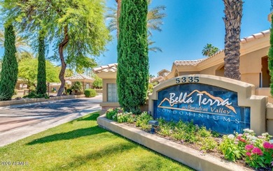 This bright second-floor condo features vaulted ceilings and an on Stonecreek Golf Club in Arizona - for sale on GolfHomes.com, golf home, golf lot