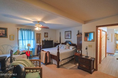 If you are looking for quiet, relaxed living in a natural on The Lakes Country Club in North Carolina - for sale on GolfHomes.com, golf home, golf lot