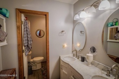 If you are looking for quiet, relaxed living in a natural on The Lakes Country Club in North Carolina - for sale on GolfHomes.com, golf home, golf lot