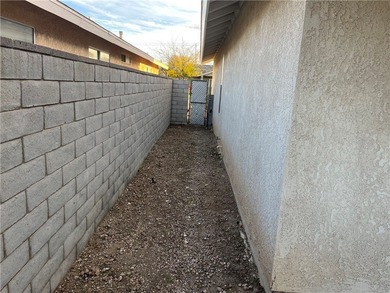 Welcome home to comfort, style, and a fantastic central Kingman on Cerbat Cliffs Golf Course in Arizona - for sale on GolfHomes.com, golf home, golf lot