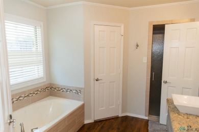 This beautiful four-bedroom home, located on a spacious circle on Chaparral Country Club in New Mexico - for sale on GolfHomes.com, golf home, golf lot