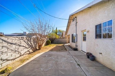 Welcome home to comfort, style, and a fantastic central Kingman on Cerbat Cliffs Golf Course in Arizona - for sale on GolfHomes.com, golf home, golf lot