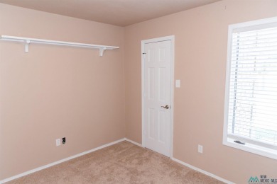 This beautiful four-bedroom home, located on a spacious circle on Chaparral Country Club in New Mexico - for sale on GolfHomes.com, golf home, golf lot