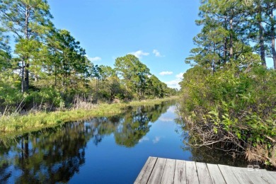 This is your perfect Fort Morgan beach getaway! This home is a on Kiva Dunes Golf Club in Alabama - for sale on GolfHomes.com, golf home, golf lot