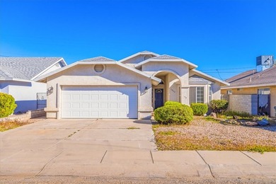 Welcome home to comfort, style, and a fantastic central Kingman on Cerbat Cliffs Golf Course in Arizona - for sale on GolfHomes.com, golf home, golf lot