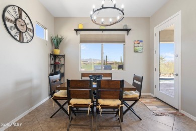 This stunning oasis is located on the 16th hole in Estrella's on Estrella Mountain Ranch Golf Course in Arizona - for sale on GolfHomes.com, golf home, golf lot