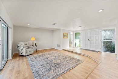 WATERFRONT SERENITY IN NEW PORT RICHEY - YOUR COASTAL ESCAPE on Gulf Harbors Golf Course in Florida - for sale on GolfHomes.com, golf home, golf lot