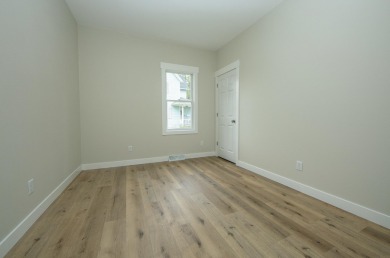 This beautifully redone 3-bedroom, 1-bathroom home offers modern on Nashua Town and Country Club in Iowa - for sale on GolfHomes.com, golf home, golf lot