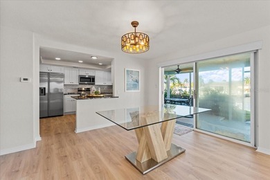 WATERFRONT SERENITY IN NEW PORT RICHEY - YOUR COASTAL ESCAPE on Gulf Harbors Golf Course in Florida - for sale on GolfHomes.com, golf home, golf lot