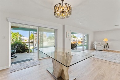 WATERFRONT SERENITY IN NEW PORT RICHEY - YOUR COASTAL ESCAPE on Gulf Harbors Golf Course in Florida - for sale on GolfHomes.com, golf home, golf lot