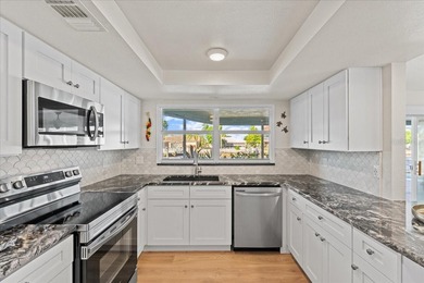 WATERFRONT SERENITY IN NEW PORT RICHEY - YOUR COASTAL ESCAPE on Gulf Harbors Golf Course in Florida - for sale on GolfHomes.com, golf home, golf lot