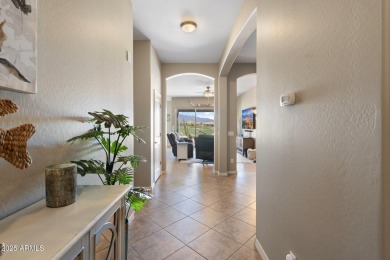 This stunning oasis is located on the 16th hole in Estrella's on Estrella Mountain Ranch Golf Course in Arizona - for sale on GolfHomes.com, golf home, golf lot
