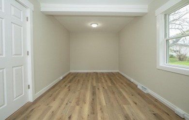 This beautifully redone 3-bedroom, 1-bathroom home offers modern on Nashua Town and Country Club in Iowa - for sale on GolfHomes.com, golf home, golf lot