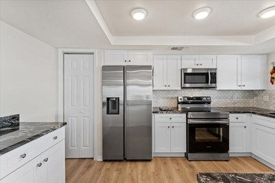 WATERFRONT SERENITY IN NEW PORT RICHEY - YOUR COASTAL ESCAPE on Gulf Harbors Golf Course in Florida - for sale on GolfHomes.com, golf home, golf lot