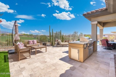 This stunning oasis is located on the 16th hole in Estrella's on Estrella Mountain Ranch Golf Course in Arizona - for sale on GolfHomes.com, golf home, golf lot
