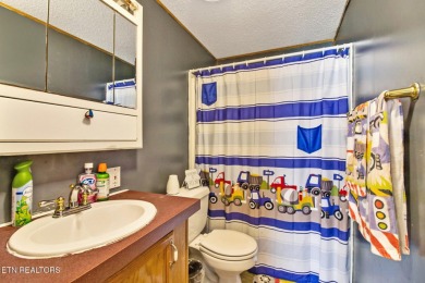 Charming Lakefront Home with Dock on Geronimo Lake

Discover on Lake Tansi Village Country Club in Tennessee - for sale on GolfHomes.com, golf home, golf lot