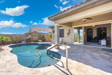 This stunning oasis is located on the 16th hole in Estrella's on Estrella Mountain Ranch Golf Course in Arizona - for sale on GolfHomes.com, golf home, golf lot