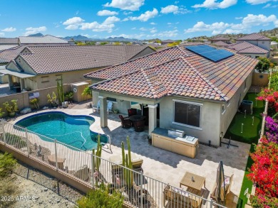 This stunning oasis is located on the 16th hole in Estrella's on Estrella Mountain Ranch Golf Course in Arizona - for sale on GolfHomes.com, golf home, golf lot