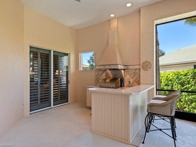 Experience timeless craftsmanship and refined comfort in this on Bonita Bay West in Florida - for sale on GolfHomes.com, golf home, golf lot