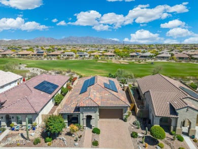 This stunning oasis is located on the 16th hole in Estrella's on Estrella Mountain Ranch Golf Course in Arizona - for sale on GolfHomes.com, golf home, golf lot