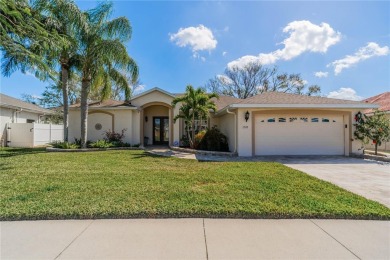 Welcome to your dream home! Nestled on #3 Tee of Cypress Creek on The Golf Club of Cypress Creek in Florida - for sale on GolfHomes.com, golf home, golf lot