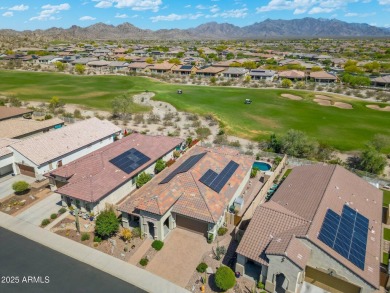 This stunning oasis is located on the 16th hole in Estrella's on Estrella Mountain Ranch Golf Course in Arizona - for sale on GolfHomes.com, golf home, golf lot