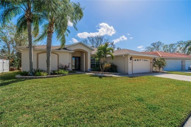 Welcome to your dream home! Nestled on #3 Tee of Cypress Creek on The Golf Club of Cypress Creek in Florida - for sale on GolfHomes.com, golf home, golf lot