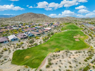 This stunning oasis is located on the 16th hole in Estrella's on Estrella Mountain Ranch Golf Course in Arizona - for sale on GolfHomes.com, golf home, golf lot
