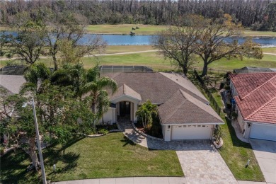 Welcome to your dream home! Nestled on #3 Tee of Cypress Creek on The Golf Club of Cypress Creek in Florida - for sale on GolfHomes.com, golf home, golf lot