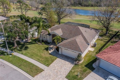 Welcome to your dream home! Nestled on #3 Tee of Cypress Creek on The Golf Club of Cypress Creek in Florida - for sale on GolfHomes.com, golf home, golf lot