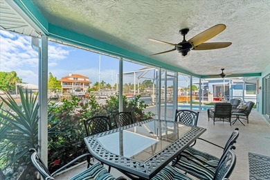 WATERFRONT SERENITY IN NEW PORT RICHEY - YOUR COASTAL ESCAPE on Gulf Harbors Golf Course in Florida - for sale on GolfHomes.com, golf home, golf lot