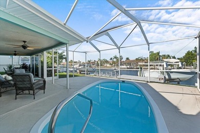 WATERFRONT SERENITY IN NEW PORT RICHEY - YOUR COASTAL ESCAPE on Gulf Harbors Golf Course in Florida - for sale on GolfHomes.com, golf home, golf lot