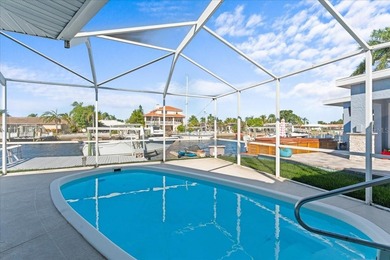 WATERFRONT SERENITY IN NEW PORT RICHEY - YOUR COASTAL ESCAPE on Gulf Harbors Golf Course in Florida - for sale on GolfHomes.com, golf home, golf lot