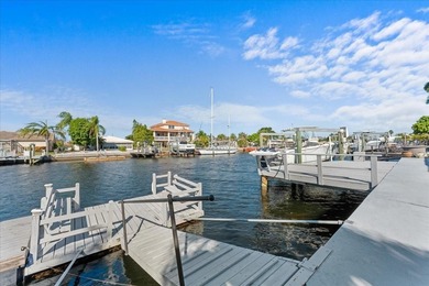 WATERFRONT SERENITY IN NEW PORT RICHEY - YOUR COASTAL ESCAPE on Gulf Harbors Golf Course in Florida - for sale on GolfHomes.com, golf home, golf lot