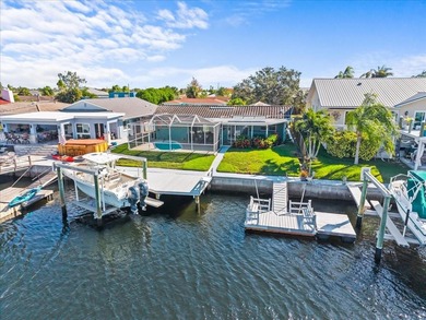 WATERFRONT SERENITY IN NEW PORT RICHEY - YOUR COASTAL ESCAPE on Gulf Harbors Golf Course in Florida - for sale on GolfHomes.com, golf home, golf lot