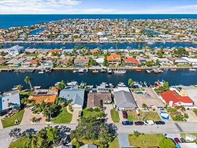 WATERFRONT SERENITY IN NEW PORT RICHEY - YOUR COASTAL ESCAPE on Gulf Harbors Golf Course in Florida - for sale on GolfHomes.com, golf home, golf lot
