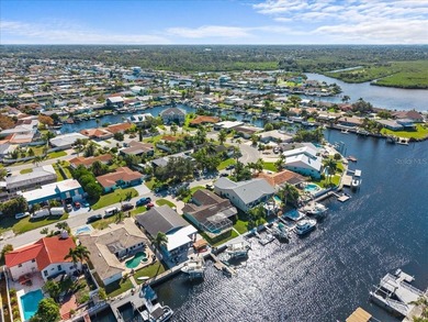 WATERFRONT SERENITY IN NEW PORT RICHEY - YOUR COASTAL ESCAPE on Gulf Harbors Golf Course in Florida - for sale on GolfHomes.com, golf home, golf lot