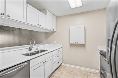 Enjoy serene lake and golf course views from this beautifully on Vista Plantation Golf Club in Florida - for sale on GolfHomes.com, golf home, golf lot