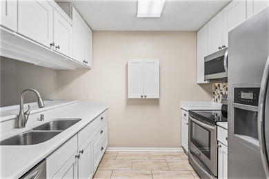 Enjoy serene lake and golf course views from this beautifully on Vista Plantation Golf Club in Florida - for sale on GolfHomes.com, golf home, golf lot