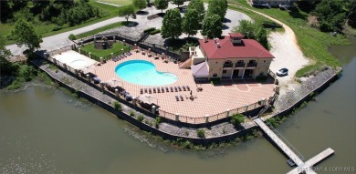 Imagine waking up to serene golf course views every day! This on The Club At Porto Cima in Missouri - for sale on GolfHomes.com, golf home, golf lot