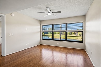 Enjoy serene lake and golf course views from this beautifully on Vista Plantation Golf Club in Florida - for sale on GolfHomes.com, golf home, golf lot