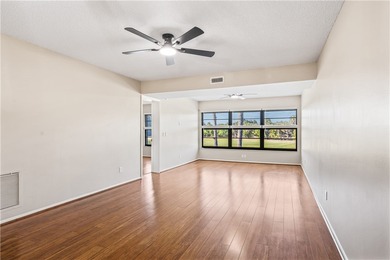 Enjoy serene lake and golf course views from this beautifully on Vista Plantation Golf Club in Florida - for sale on GolfHomes.com, golf home, golf lot