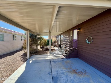 Come check this corner lot property out! This park model has on Juniper Ridge R.V. Golf Resort in Arizona - for sale on GolfHomes.com, golf home, golf lot