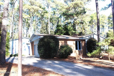 LOCATION & LOW INVENTORY in the heart of the popular SPRING on Whispering Pines Golf Course in North Carolina - for sale on GolfHomes.com, golf home, golf lot